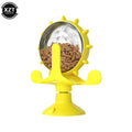 A yellow treat-dispensing toy with a spiked, clear globe filled with treats. The toy has a suction cup base and is designed to rotate, providing an interactive and engaging experience for cats.